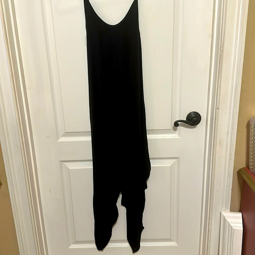 Spaghetti strap soft cotton/tee shirt material romper. Very roomy and comfy